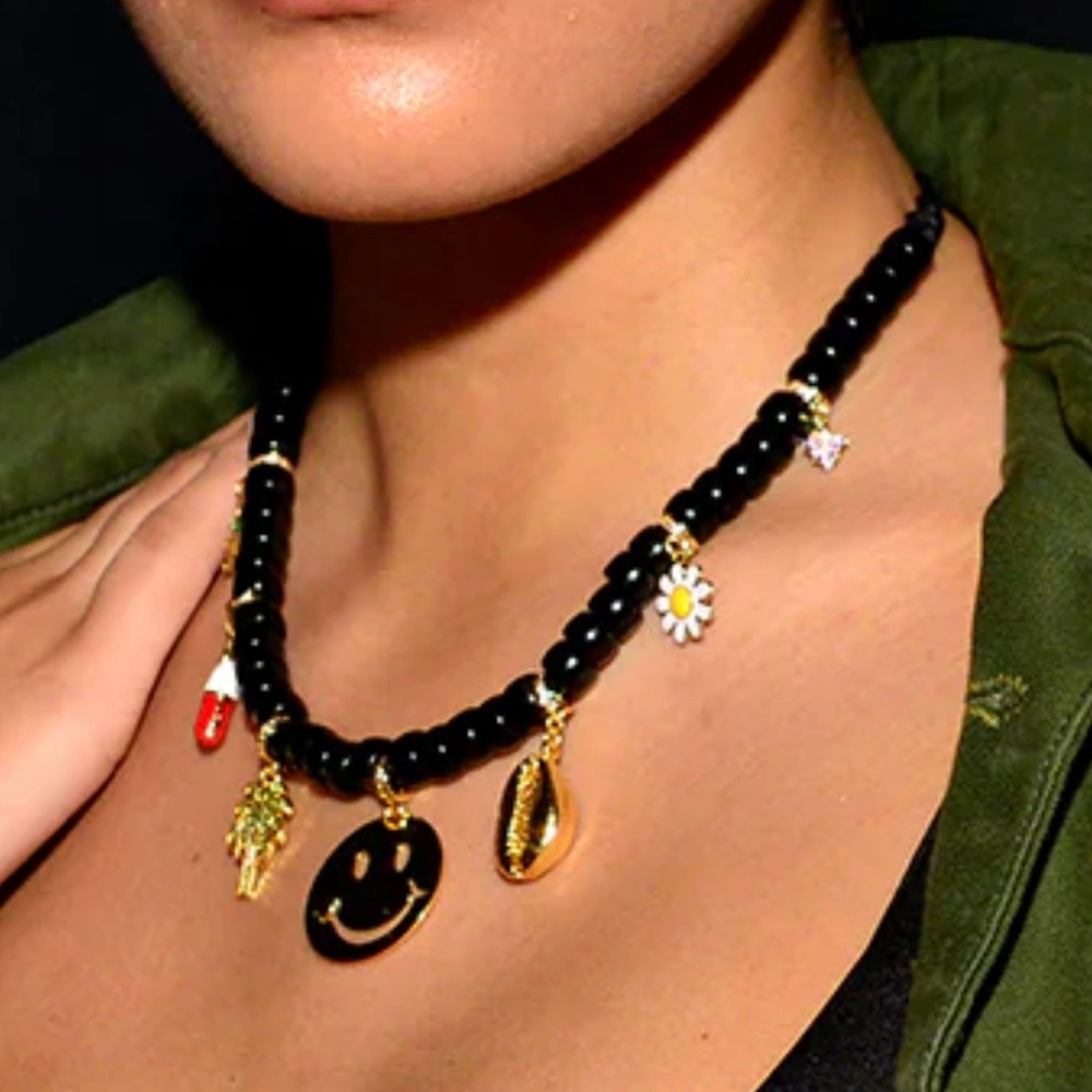 Venessa Arizaga Happy Pill Charm necklace.